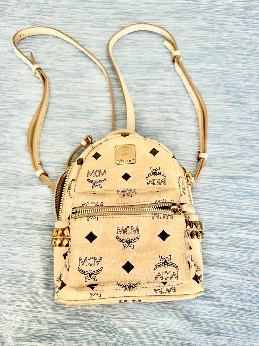 MCM Beige Visetos Mini Backpack with Gold Stud Accents